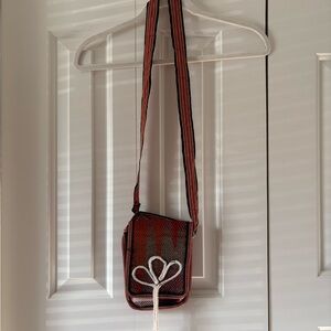 Woven Red Crossbody Bag with Decorative Knot
